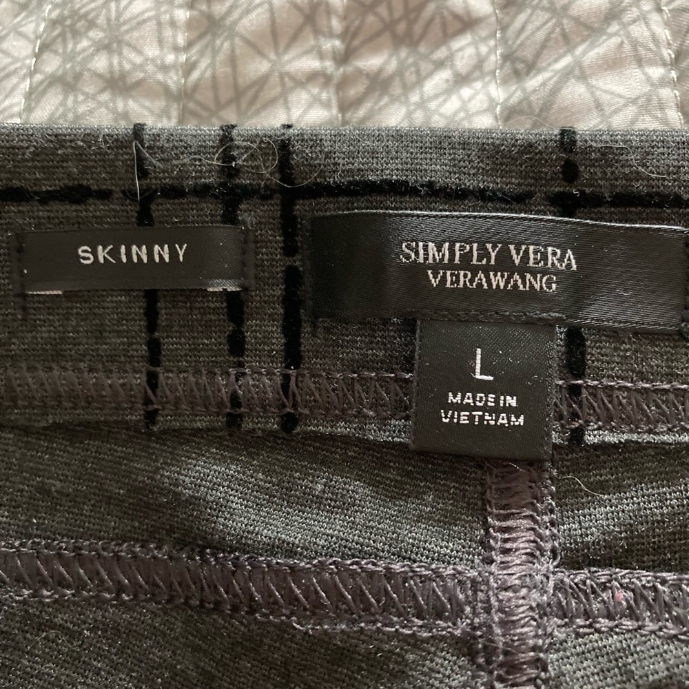 black/grey plaid trousers.